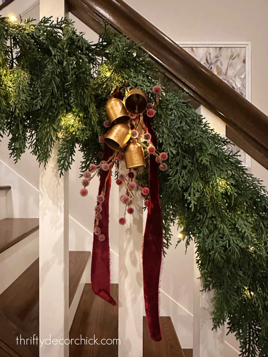 bells and berries in stair garland